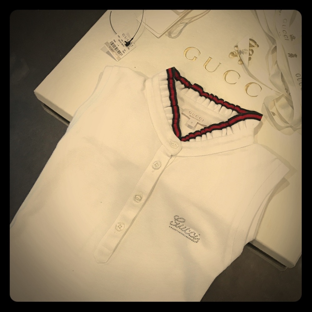 Gucci web collar and Swarovski logo dress!